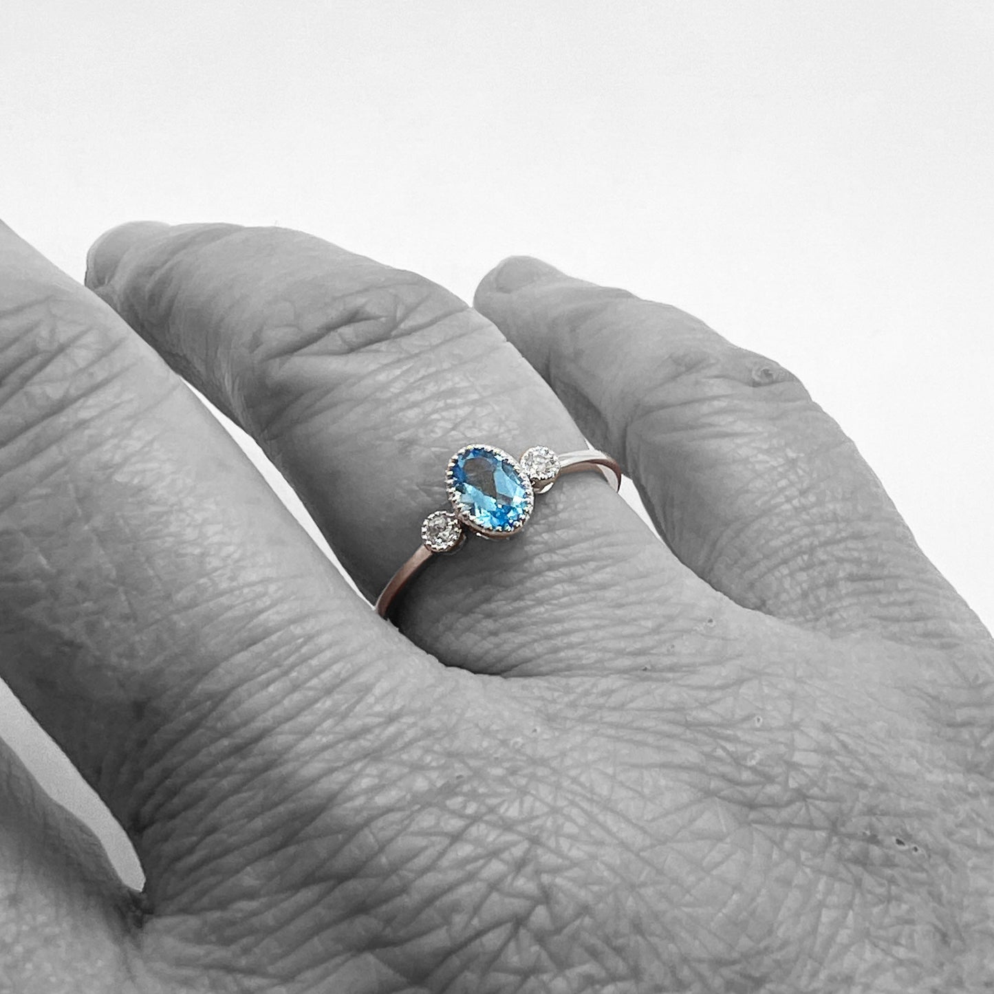 14kw Blue Topaz and Diamond Ring