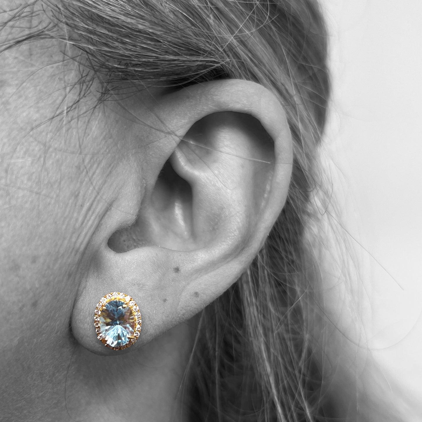 18ky Blue Topaz and Diamond Halo Earrings
