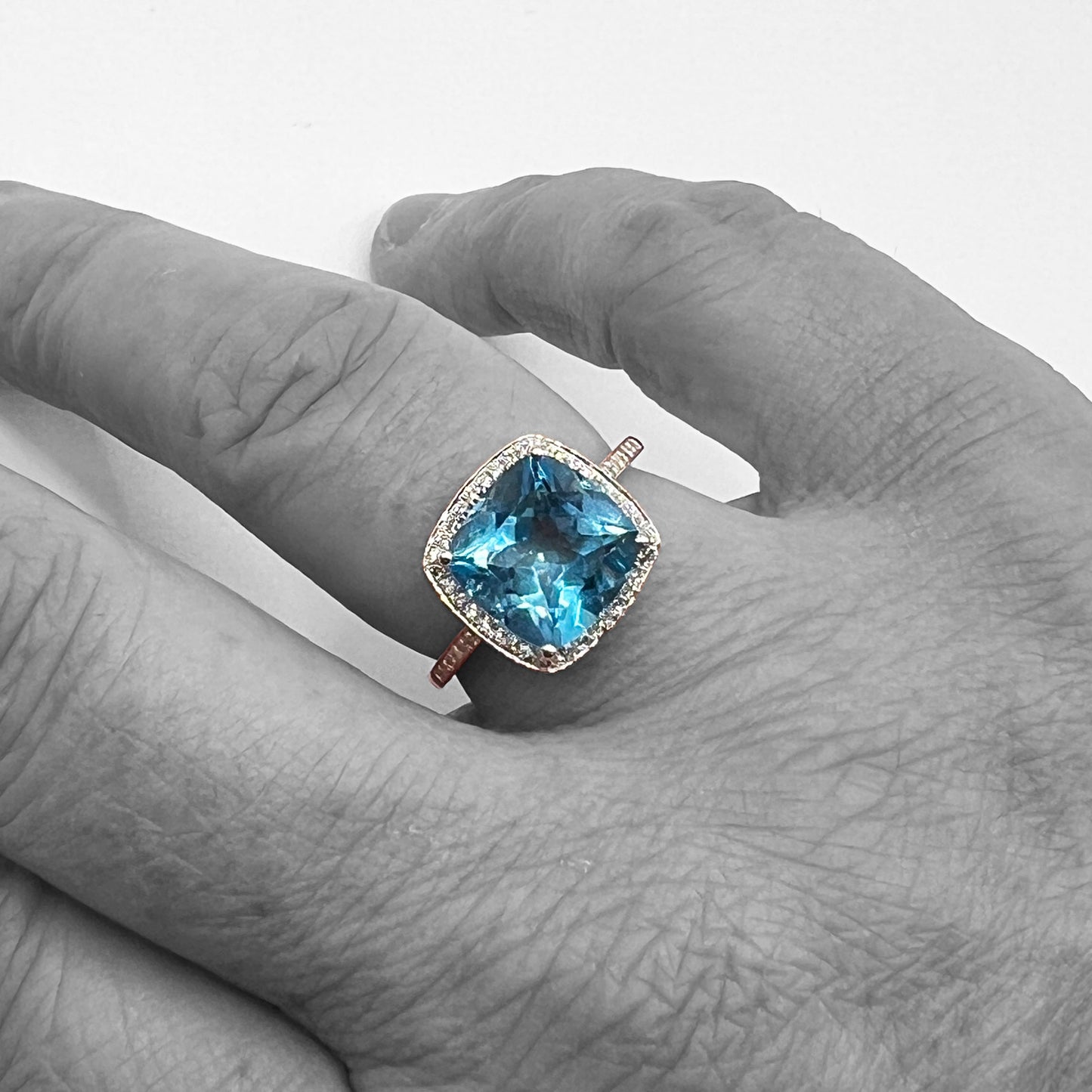 14kw Blue Topaz Ring with Diamond Halo
