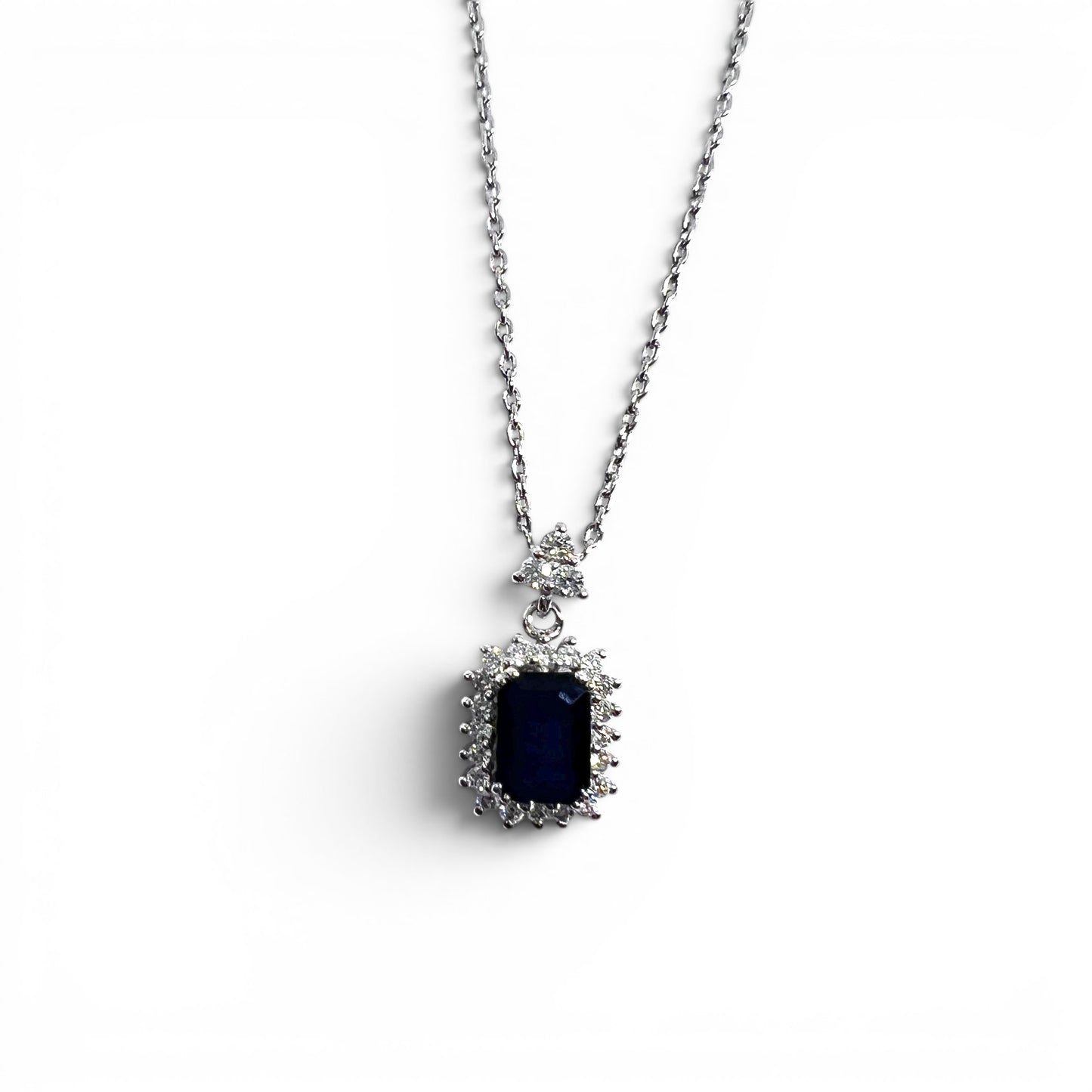 18kw Blue Sapphire & Diamond Halo Pendant