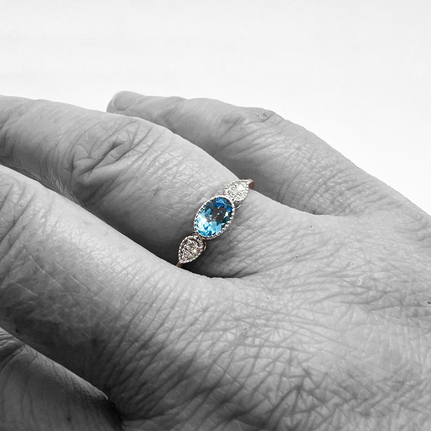 14kw Blue Topaz and Diamond Ring